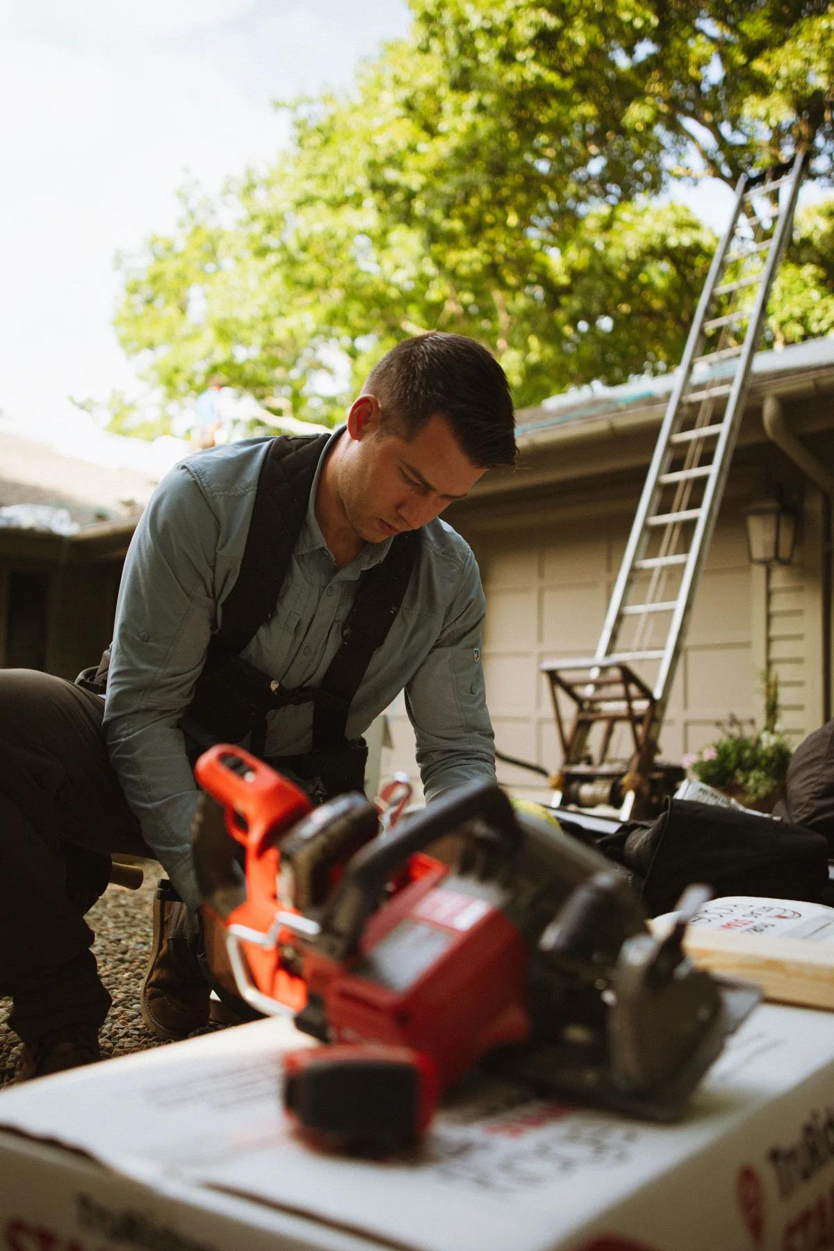 A service professional at work, with an illustrative missed-call text-back message